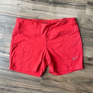 Bright Coral Nike DryFit spandex shorts, size M